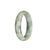 Genuine Grade A Greyish White with Light Brown and Bluish Green PatternsJadeite Jade Bracelet - 53mm Oval