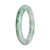 A round, genuine natural green jade bangle bracelet with a traditional design, measuring 56mm. Perfect for adding a touch of elegance to any outfit.