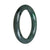 Close-up photo of a round dark grey and green jade bangle bracelet, measuring 57mm in diameter. The bracelet is made of genuine grade A jade and has a sleek and elegant design.