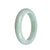 A genuine greyish white jade bangle with a semi-round shape, measuring 56mm.