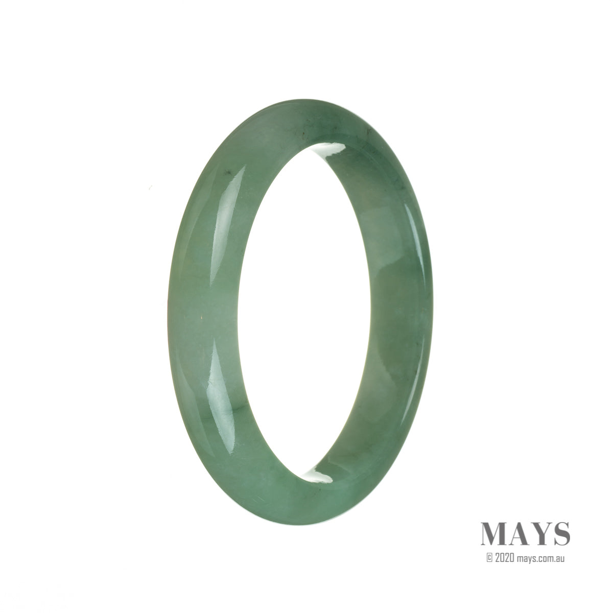 A close-up of a beautiful green jadeite bracelet with a semi-round shape, measuring 59mm in diameter. This genuine type A jadeite is a stunning piece of jewelry from MAYS.