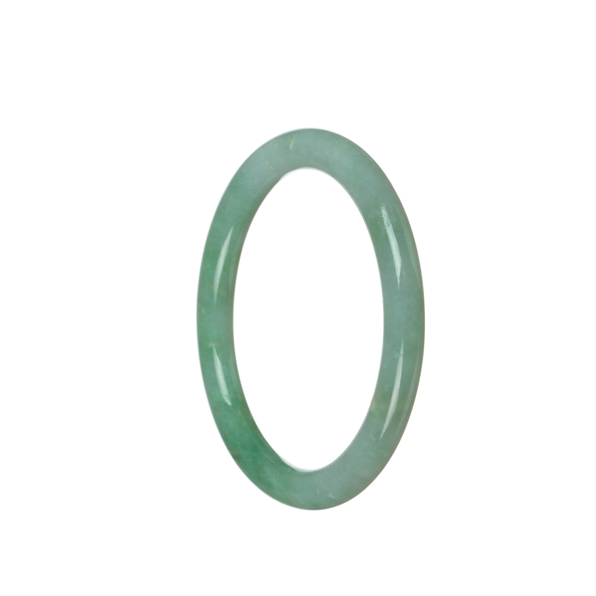 A round, untreated green Burmese jade bangle bracelet, measuring 57mm in diameter, from the MAYS collection.