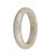 A half-moon shaped, genuine Type A Burma Jade bangle with a greyish lavender hue, measuring 58mm. Designed by MAYS.