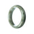 A close-up image of a Real Grade A Grey Traditional Jade Bracelet, featuring a 59mm half moon design.
