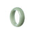 A beautiful half moon shaped jade bangle made of genuine Grade A Green Burma Jade, perfect for children.