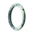 A round bracelet made of certified natural grey green Burmese jade, measuring 59mm in size.